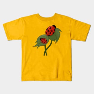 Two cute ladybugs on a plant Kids T-Shirt